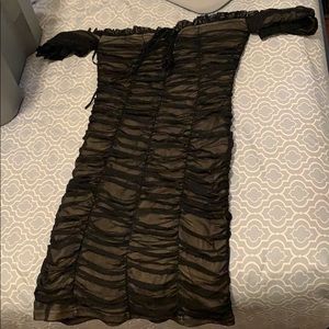 Lulu’s black with nude underlay ruched dress
